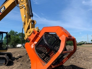 The SB16 excavator attachment from the side.