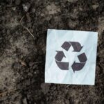 Soil as a Recycling System: Soil with a recycling sign on it.